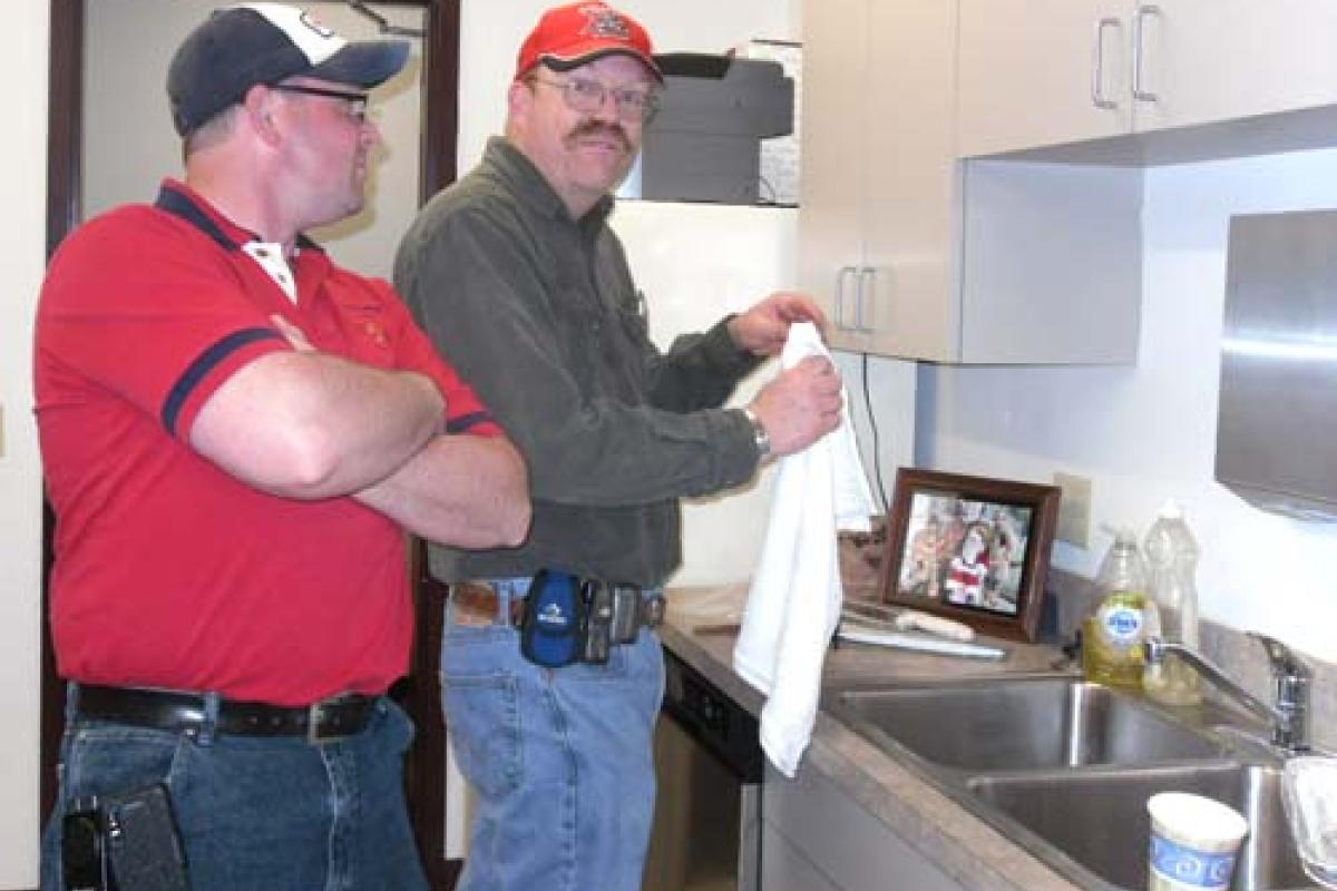 Men washing dishes