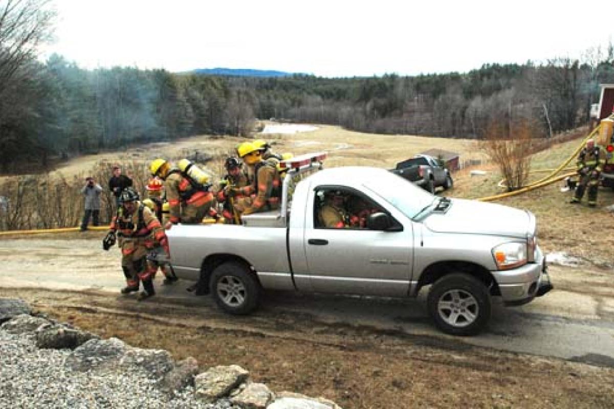 firefighters in a truck