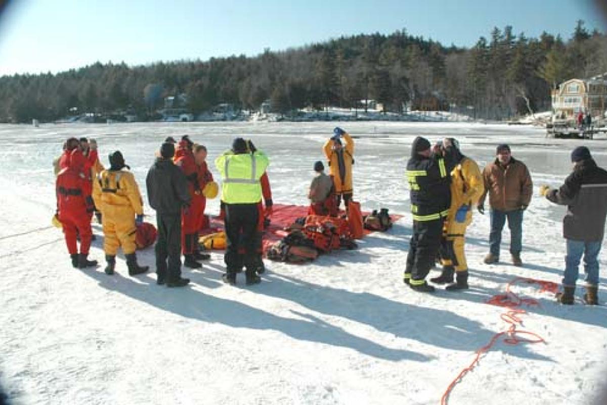 Firemen on a frozen lake