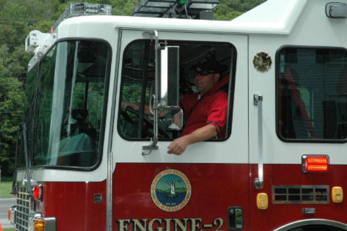 Man driving a firetruck