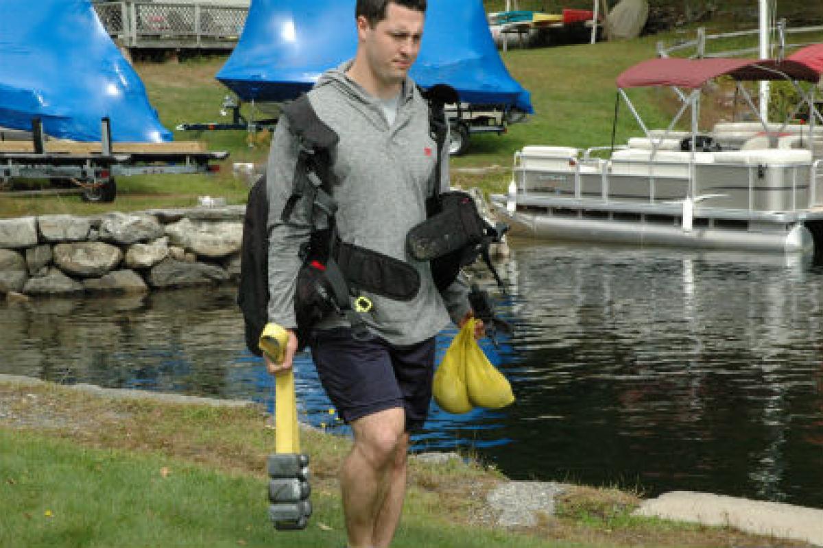 Man putting on dive gear